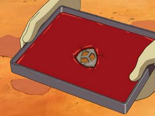 Fichier:DP108 - Sacha Badge Mine.png