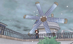 Kalem devant le moulin de La Frescale dans Pokémon X et Y.