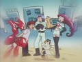 Miaouss (Team Rocket) et Cizayox (d'un Dresseur)