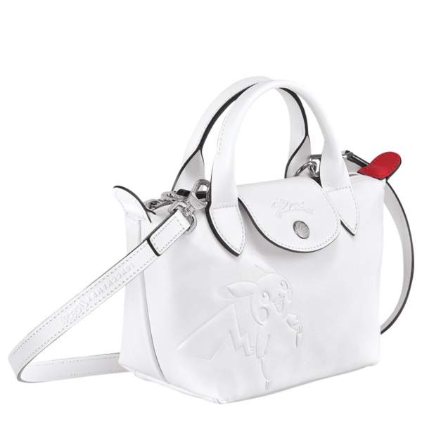 Fichier:Longchamp Petit sac à main blanc trois quart.png