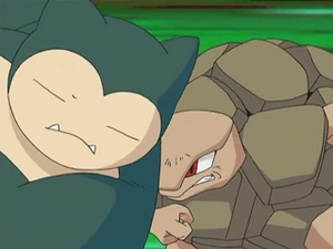 DP141 - Ronflex et Grolem d'un Dresseur.png