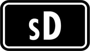 Symbole V Sutāto Dekki JCC.png